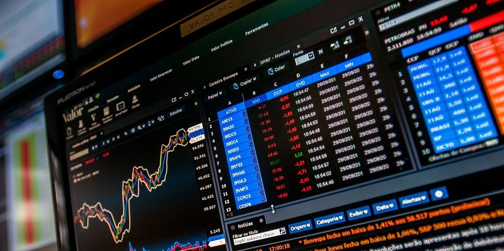 notebook com página do mercado financeiro aberta